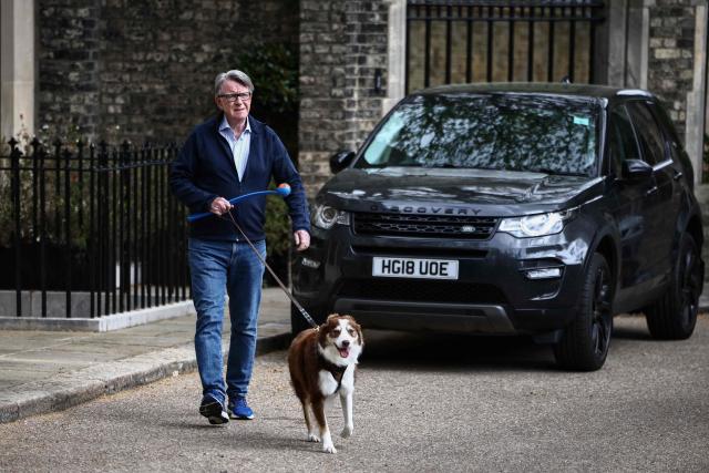 Former UK ambassador to the United States, Peter Mandelson, walks his dog outside his residence in central London on April 20, 2026. Britain's embattled Prime Minister Keir Starmer will face lawmakers in parliament on April 20 as he bids to quell anger over an unrelenting scandal involving long-time Jeffrey Epstein associate Peter Mandelson. (Photo by Henry NICHOLLS / AFP)