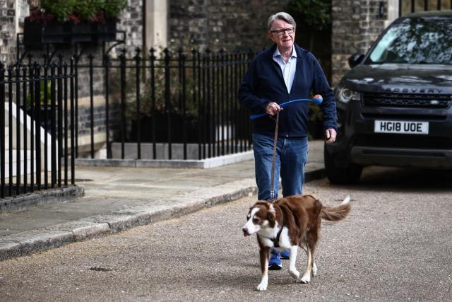 Former UK ambassador to the United States, Peter Mandelson, walks his dog outside his residence in central London on April 20, 2026. Britain's embattled Prime Minister Keir Starmer will face lawmakers in parliament on April 20 as he bids to quell anger over an unrelenting scandal involving long-time Jeffrey Epstein associate Peter Mandelson. (Photo by Henry NICHOLLS / AFP)