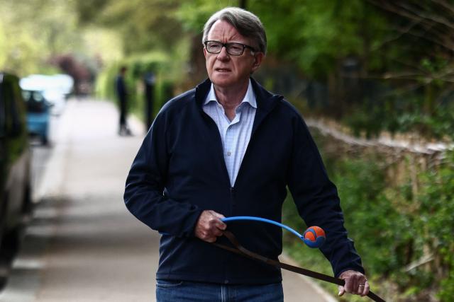 Former UK ambassador to the United States, Peter Mandelson, walks his dog near his residence in central London on April 20, 2026. Britain's embattled Prime Minister Keir Starmer will face lawmakers in parliament on April 20 as he bids to quell anger over an unrelenting scandal involving long-time Jeffrey Epstein associate Peter Mandelson. (Photo by Henry NICHOLLS / AFP)