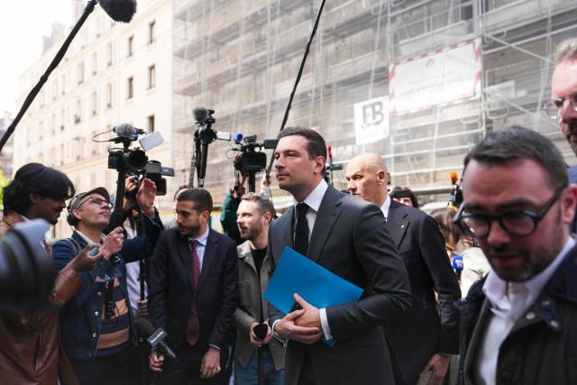 French far-right Rassemblement National RN party's President Jordan Bardella arrives for his lunch with French union Movement of the Enterprises of France (Medef) in Paris on April 20, 2026. (Photo by Dimitar DILKOFF / AFP)
