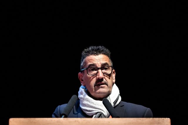 General secretary of the French labor union Force Ouvrière (FO) Frederic Souillot delivers a speech at the 26th national convention of the French labor union Force Ouvrière (FO) in Dijon, central-eastern France, on April 20, 2026. The secretary general of French labour union Force Ouvrière (FO), opened on April 20, 2026, the 26th congress of Frances third-largest trade union, which is being held in Dijon until Friday, by welcoming, to loud applause two of its recently released activists and former detainees in Iran. (Photo by ARNAUD FINISTRE / AFP)