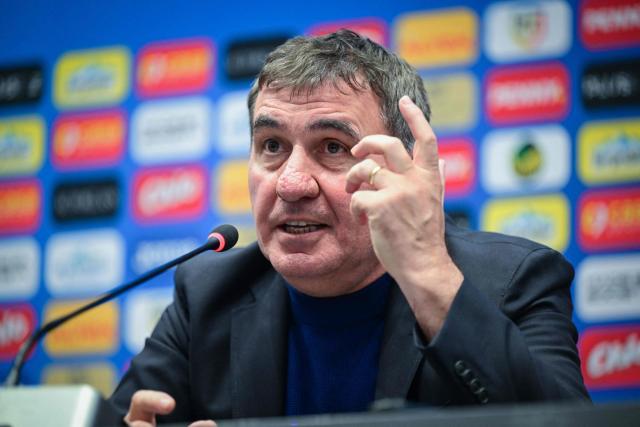 Newly appointed head coach of Romania's national football team Gheorghe Hagi gestures during a press conference in Bucharest on April 20, 2026. Hagi signed a four-year contract to return to the helm of the national team. The 61-year-old legend, nicknamed "The King" and "Maradona of the Carpathians," succeeded the late Mircea Lucescu with ambitious goals to win the Nations League and qualify for the European Championships. (Photo by Daniel MIHAILESCU / AFP)