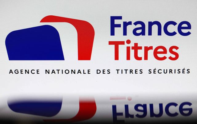 This photograph shows the logo of France Titres - Agence Nationale des Titres Securises ANTS (France's National Agency for Secure Documents) displayed on a screen in Paris on April 20, 2026. The National Agency for Secure Documents (ANTS), which processes applications for identity documents, "detected a security incident" on April 15, 2026, that may involve the personal data of individuals and businesses, the Home Office said in a statement on April 20, 2026. (Photo by Charlotte SIEMON / AFP)