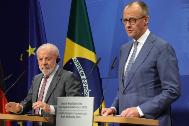 Brazilian President Luiz Inacio Lula da Silva (L) and German Chancellor Friedrich Merz address a joint press conference after the German-Brazilian governmental consultations meeting in Hanover, northern Germany on April 20, 2026, that is taking place on the sidelines of the Hannover Messe industrial trade fair. Brazil is the 2026 partner country of the fair, that will be running until April 24, 2026. (Photo by Odd ANDERSEN / AFP)