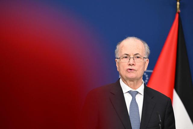 Palestinian Prime Minister Mohamed Mustafa speaks during a joint press statement with Norwegian Minister for Foreign Affairs and EU High Representative and Vice-President for Foreign Affairs and Security Policy before a Ad Hoc Liaison Committee (AHLC) Ministerial Meeting, in Brussels on April 20, 2026. European backers put on a show of support for the Palestinian Authority and the push for a two-state solution, as the US-Israeli war with Iran has dragged focus away from Gaza. (Photo by Nicolas TUCAT / AFP)