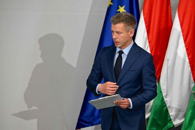 Election winner and leader of Hungary's TISZA party Peter Magyar leaves after a press conference following the first official meeting of TISZA's new parliamentary group at the HUNGEXPO Congress and Exhibition Center in Budapest, Hungary, on April 20, 2026. Hungary's nationalist long-time Prime Minister Viktor Orban lost on April 12, 2026 to political newcomer, conservative pro-EU Peter Magyar, whose party won a two-thirds parliamentary majority in a vote marked by record turnout in the central European country. (Photo by Attila KISBENEDEK / AFP)