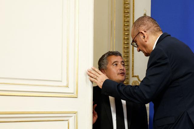 France's Justice Minister Gerald Darmanin (L) and France's Interior Minister Laurent Nunez speak as they leave a press conference as part of the 6th Ministerial Meeting of the European Coalition against Organized Crime at the Hotel de Beauvau, the French Interior Ministry, in Paris on April 20, 2026. (Photo by Kenzo TRIBOUILLARD / AFP)