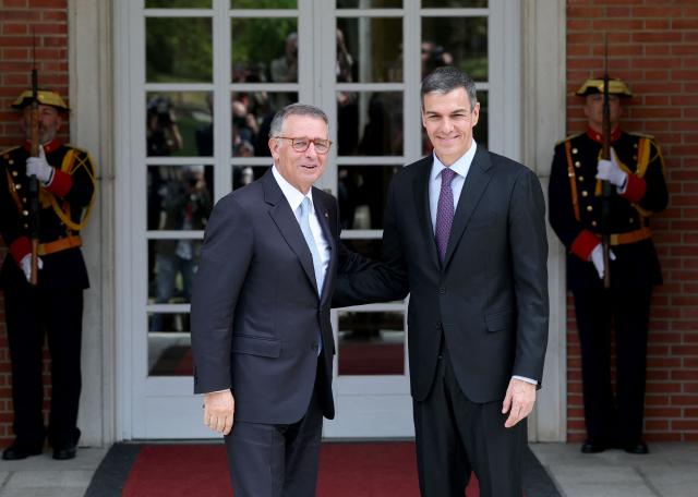 Spain's Prime Minister Pedro Sanchez greets Portugal's President Jose Antonio Seguro at the Moncloa Palace in Madrid on April 20, 2026. (Photo by Pierre-Philippe MARCOU / AFP)
