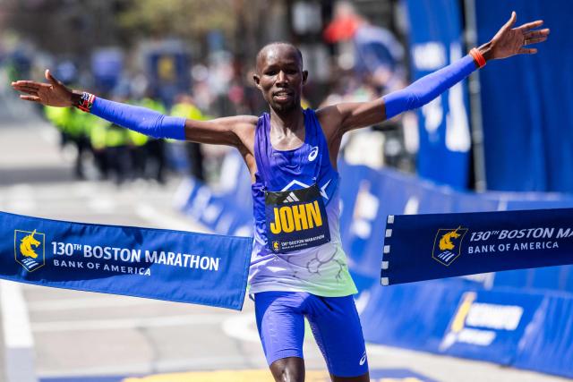 Kenyan long-distance runner John Korir crosses the finish line as he wins the men's division during the 130th Boston Marathon on April 20, 2026, in Boston, Massachusetts. (Photo by Joseph Prezioso / AFP)