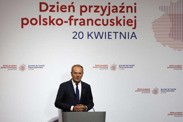 Polish Prime Minister Donald Tusk addresses guests during the ceremony for the presentation of the Bronislaw Geremek Award at the European Solidarity Centre in Gdansk, Poland, on April 20, 2026 during the French President's one-day visit to Poland. (Photo by Ludovic MARIN / AFP)