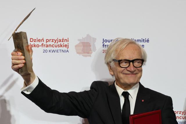 Laureate Polish actor and director Andrzej Seweryn reacts after having received the Bronislaw Geremek Award during a ceremony at the European Solidarity Centre in Gdansk, Poland, on April 20, 2026 during the French President's one-day visit to Poland. (Photo by Ludovic MARIN / AFP)