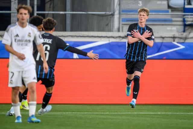 Club Brugge's Danish midfielder #78 Tobias Lund Jensen celebrates scoring his team's first goal during the UEFA Youth League final football match between Club Brugge and Real Madrid at Stade de la Tuiliere in Lausanne, on April 20, 2026. (Photo by Fabrice COFFRINI / AFP)