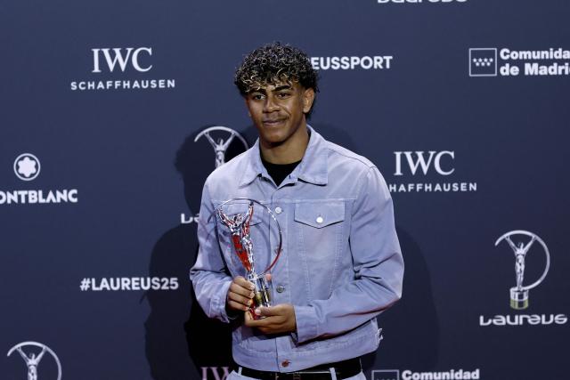 Barcelona's Spanish forward Lamine Yamal poses with the Young Sportsman Award during the 27th Laureus World Sports Awards gala in Madrid on April 20, 2026. (Photo by Oscar DEL POZO / AFP)