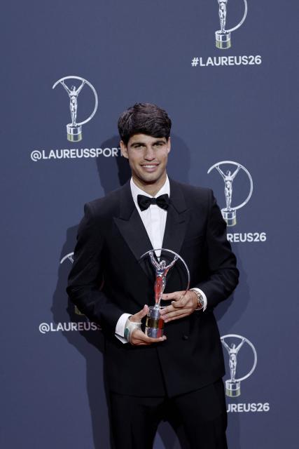 Spain's tennis player Carlos Alcaraz poses with the Sportsman of the Year Award during the 27th Laureus World Sports Awards gala in Madrid on April 20, 2026. (Photo by Oscar DEL POZO / AFP)