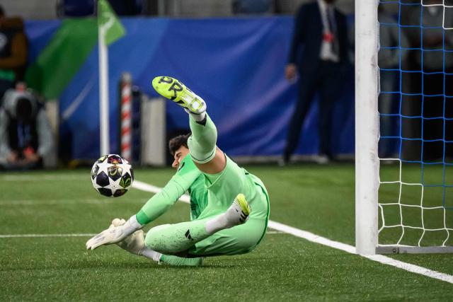 Real Madrid's Spanish goalkeeper #1 Javier Navarro block a ball during the penalty shoot-out during the UEFA Youth League final football match between Club Brugge and Real Madrid at Stade de la Tuiliere in Lausanne, on April 20, 2026. (Photo by Fabrice COFFRINI / AFP)