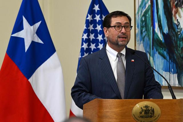 Chile's Foreign Minister Francisco Perez Mackenna speaks during the signing of agreements between Chile and the United States on mining and security in Santiago on April 20, 2026. (Photo by RODRIGO ARANGUA / AFP)