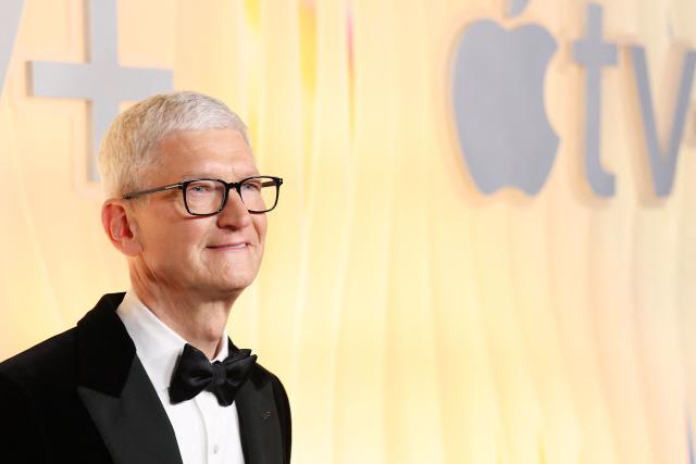 (FILES) Apple CEO Tim Cook arrives for Apple TV+'s Primetime Emmy Party in West Hollywood, California, on September 14, 2025. Apple announced on April 20, 2026 that Cook would step down in September. (Photo by Michael Tran / AFP)