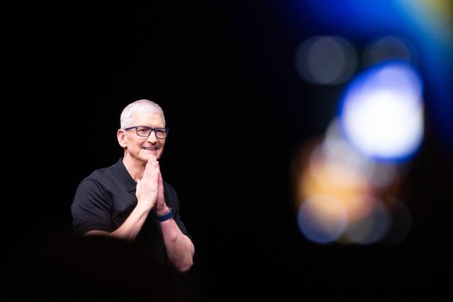 (FILES) Apple CEO Tim Cook speaks during Apple's "Awe-Dropping" event at the Steve Jobs Theater on the Apple Park campus in Cupertino, California, on September 9, 2025. Apple announced on April 20, 2026 that Cook would step down in September. (Photo by Nic Coury / AFP)