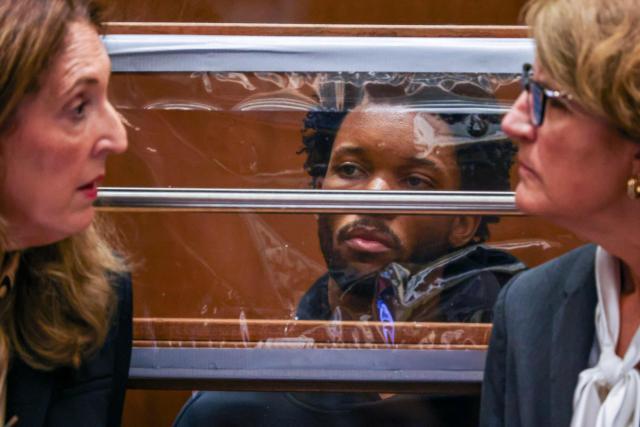 US singer D4vd is seen during his arraignment at Clara Shortridge Foltz Criminal Justice Center in Los Angeles, on April 20, 2026. Singer D4vd was charged Monday with the murder and dismemberment of a teenage girl whose decomposing body was found in an abandoned Tesla in the Hollywood Hills. The 21-year-old, whose real name is David Anthony Burke, appeared in court Monday to face multiple charges over the horrifying death of Celeste Rivas Hernandez, whose body was found in September, within days of what would have been her 15th birthday. (Photo by Ted Soqui / POOL / AFP)