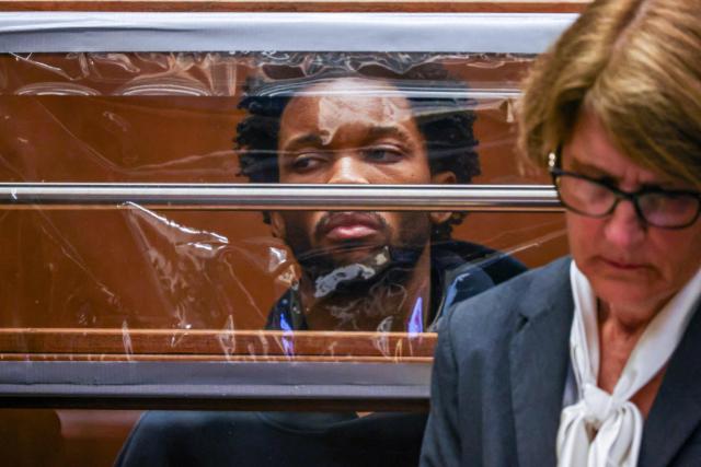 US singer D4vd is seen during his arraignment at Clara Shortridge Foltz Criminal Justice Center in Los Angeles, on April 20, 2026. Singer D4vd was charged Monday with the murder and dismemberment of a teenage girl whose decomposing body was found in an abandoned Tesla in the Hollywood Hills. The 21-year-old, whose real name is David Anthony Burke, appeared in court Monday to face multiple charges over the horrifying death of Celeste Rivas Hernandez, whose body was found in September, within days of what would have been her 15th birthday. (Photo by Ted Soqui / POOL / AFP)