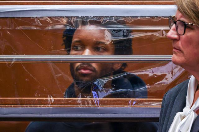 US singer D4vd is seen during his arraignment at Clara Shortridge Foltz Criminal Justice Center in Los Angeles, on April 20, 2026. Singer D4vd was charged Monday with the murder and dismemberment of a teenage girl whose decomposing body was found in an abandoned Tesla in the Hollywood Hills. The 21-year-old, whose real name is David Anthony Burke, appeared in court Monday to face multiple charges over the horrifying death of Celeste Rivas Hernandez, whose body was found in September, within days of what would have been her 15th birthday. (Photo by Ted Soqui / POOL / AFP)