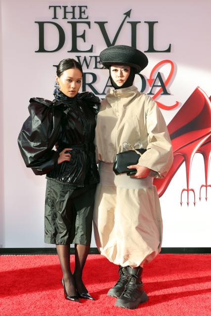 South Korean singer-actress Rei Ami (L) and celebrity stylist Ayumi Perry attend the world premiere of "The Devil Wears Prada 2" at Lincoln Center in New York City, on April 20, 2026. (Photo by ANGELA WEISS / AFP)