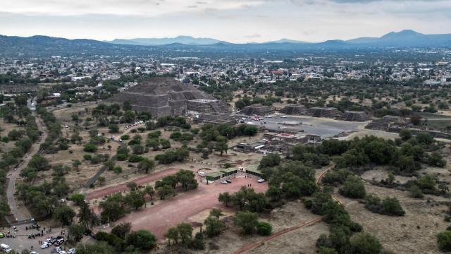 An aerial view shows the Pyramid of the Moon at the Teotihuacan archaeological zone following a shooting in Teotihuacan, State of Mexico, on April 20, 2026. A Canadian woman was shot dead on April 20 at the Teotihuacan pyramids archaeological zone in central Mexico by a man who later killed himself, authorities said. (Photo by Yuri CORTEZ / AFP)