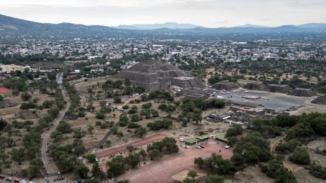 An aerial view shows the Pyramid of the Moon at the Teotihuacan archaeological zone following a shooting in Teotihuacan, State of Mexico, on April 20, 2026. A Canadian woman was shot dead on April 20 at the Teotihuacan pyramids archaeological zone in central Mexico by a man who later killed himself, authorities said. (Photo by Yuri CORTEZ / AFP)