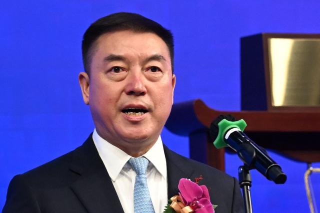 Chairman of Victory Giant Technology Chen Tao speaks at the launch of his company's IPO at the Hong Kong Exchanges and Clearing Limited (HKEX) In Hong Kong on April 21, 2026. (Photo by Peter PARKS / AFP)