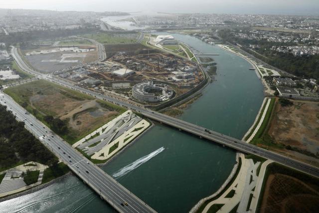 A view of the Bouregreg River, the Atlantic Ocean, and parts of the city of Rabat seen from the observation deck of the Mohammed VI Tower, in Sale on April 20, 2026. (Photo by Abdel Majid BZIOUAT / AFP)