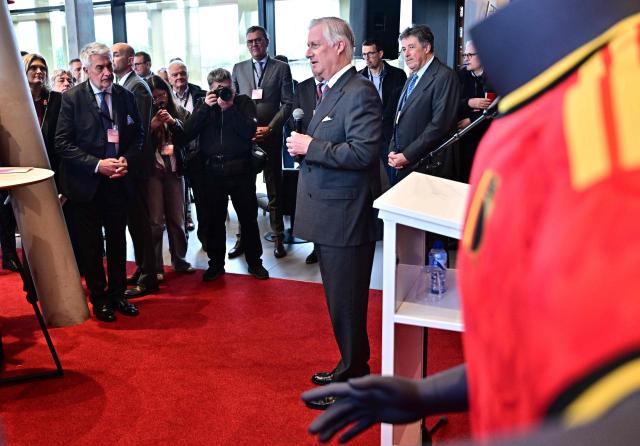 King Philippe of Belgium addresses the audience during a royal visit  organised by the Flemish and Walloon business networks VOKA and AKT with 40 business leaders from both regions at the Red Matins Hotel in Tubize on April 21, 2026. (Photo by DIRK WAEM / Belga / AFP) / Belgium OUT