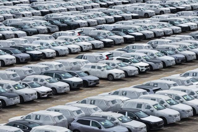 This aerial photo taken on April 20, 2026 shows Volvo cars at a port in Nanjing, in China’s eastern Jiangsu province. (Photo by CN-STR / AFP) / China OUT