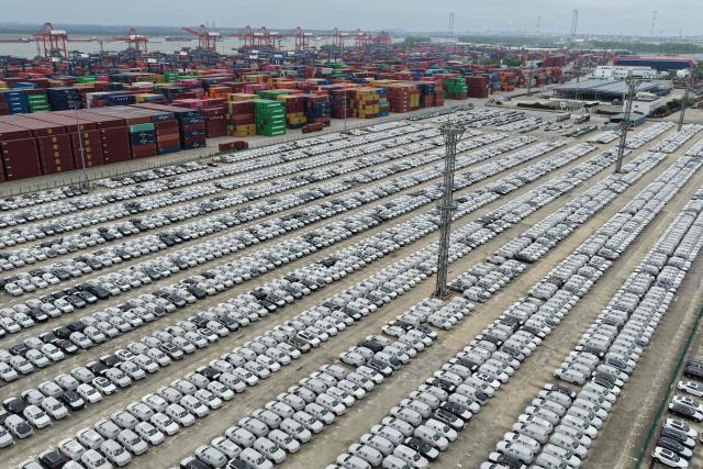 This aerial photo taken on April 20, 2026 shows Volvo cars at a port in Nanjing, in China’s eastern Jiangsu province. (Photo by CN-STR / AFP) / China OUT