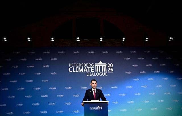 Turkey's Minister of Environment, Urbanization and Climate Change Murat Kurum addresses delegates at the start of the Petersberg Climate Dialogue (PCD) conference, on April 21, 2026 at the Westhafen Convention Center (WECC) in Berlin. The PCD is a meeting of representatives from selected countries to prepare the yearly UN Climate Change Conferences. The COP31 UN Climate Change Conference will be held in Antalya, Turkey, from November 9 to 20, 2026. (Photo by Tobias SCHWARZ / AFP)