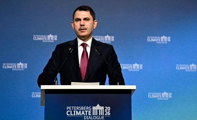 Turkey's Minister of Environment, Urbanization and Climate Change Murat Kurum addresses delegates at the start of the Petersberg Climate Dialogue (PCD) conference, on April 21, 2026 at the Westhafen Convention Center (WECC) in Berlin. The PCD is a meeting of representatives from selected countries to prepare the yearly UN Climate Change Conferences. The COP31 UN Climate Change Conference will be held in Antalya, Turkey, from November 9 to 20, 2026. (Photo by Tobias SCHWARZ / AFP)