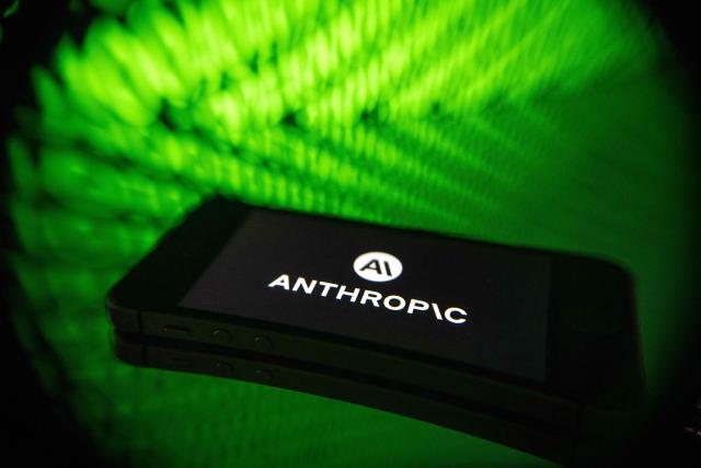 This photograph shows a smartphone displaying the logo of the US artificial intelligence safety and research company Anthropic, in Mulhouse on April 21, 2026. (Photo by SEBASTIEN BOZON / AFP)