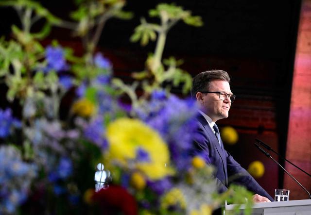 German Minister for the Environment, Climate Protection, Nature Conservation and Nuclear Safety Carsten Schneider addresses delegates at the start of the Petersberg Climate Dialogue (PCD) conference, on April 21, 2026 at the Westhafen Convention Center (WECC) in Berlin. The PCD is a meeting of representatives from selected countries to prepare the yearly UN Climate Change Conferences. The COP31 UN Climate Change Conference will be held in Antalya, Turkey, from November 9 to 20, 2026. (Photo by Tobias SCHWARZ / AFP)