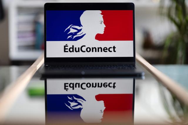 This photograph taken April 21, 2026, in Quimper, western France shows the Educonnect logo displayed on a computer screen. (Photo by Fred TANNEAU / AFP)
