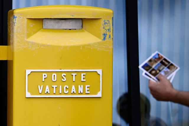 A picture shows a mailbox of the Vatican Post (Poste Vaticane) at St Peter's square in the Vatican, on April 21, 2026. (Photo by Filippo MONTEFORTE / AFP)