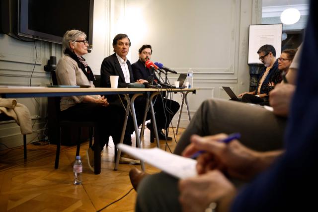 Fabienne Boulin-Burgeat (L) and her lawyers Didier Seban (C) and Antoine Sauvestre-Vinci (R) hold a press conference in Paris on April 21, 2026, four days after Versailles Public Prosecutor’s Office announced that it had requested the transfer of the judicial inquiry into the 1979 death of former minister Robert Boulin, Fabienne Boulin-Burgeat's father, to the cold cases unit of Nanterre. The body of Robert Boulin, aged 59, Minister of Labour in Raymond Barre’s government, was found in October 1979 in a pond in the Rambouillet Forest (Yvelines). Although investigators at the time concluded that he had committed suicide by drowning after taking barbiturates, his family disputes this account and believes he was murdered, as the minister had just come under scrutiny regarding the circumstances surrounding the purchase of a plot of land in Ramatuelle (Var). (Photo by SIMON WOHLFAHRT / AFP)
