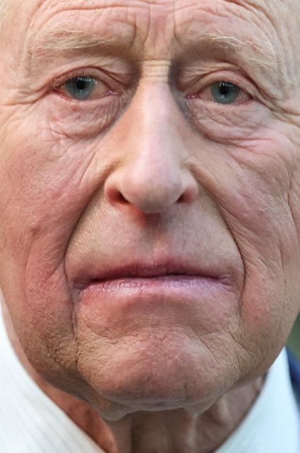 Britain's King Charles III attends a presentation on the final design for the Queen Elizabeth Memorial, during a visit to the British Museum in central London on April 21, 2026, on the day marking what would have been the late monarch's 100th birthday. (Photo by Toby Melville / POOL / AFP)