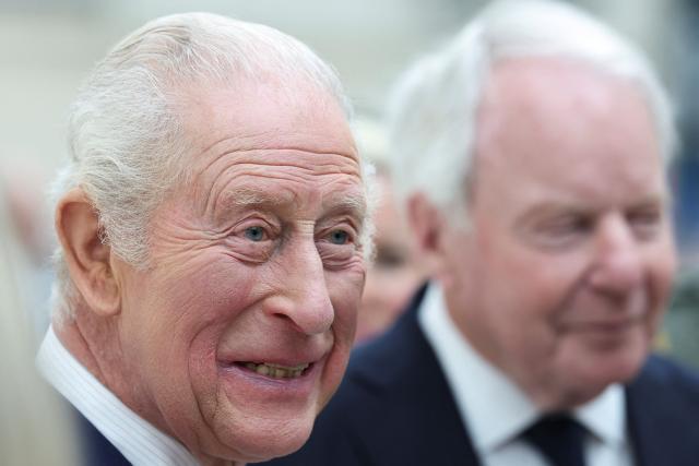 Britain's King Charles III (L) attends a presentation on the final design for the Queen Elizabeth Memorial, during a visit to the British Museum in central London on April 21, 2026, on the day marking what would have been the late monarch's 100th birthday. (Photo by Toby Melville / POOL / AFP)
