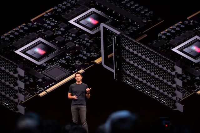 (FILES) Apple's Vice president of Hardware Engineering John Ternus discusses the internal hardware of the Mac Pro during Apple's Worldwide Developer Conference (WWDC) in San Jose, California on June 3, 2019. Apple's Tim Cook will step down as the California tech giant's chief executive this year, handing the top job to company veteran John Ternus as it navigates a technology landscape being upended by AI, the company announced on April 20, 2026. (Photo by Brittany Hosea-Small / AFP)