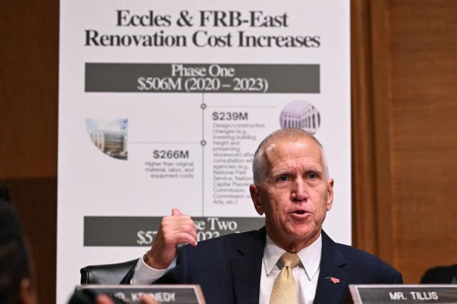 US Senator Thom Tillis, Republican from North Carolina, questions Kevin Warsh, nominee for US Federal Reserve Chair, during a Senate Banking Committee hearing on Warsh's nomination on Capitol Hill in Washington, DC, on April 21, 2026. Warsh, President Donald Trump's choice to lead the US Federal Reserve, vowed Tuesday to protect central bank independence at his confirmation hearing, despite intense pressure from the president. The hearing will be scrutinized as it marks a key hurdle that Warsh must overcome to succeed Fed Chair Jerome Powell when his term ends on May 15. (Photo by Mandel NGAN / AFP)