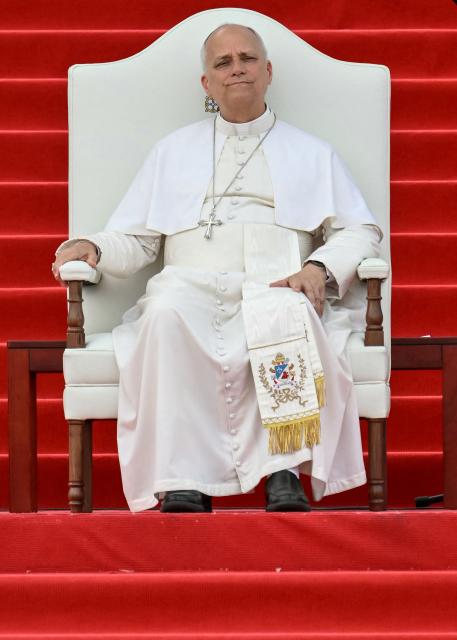 Pope Leo XIV meets with the World of Culture at the Leon XIV Campus of the National University in Malabo on the ninth day of an 11-day apostolic journey to Africa, on April 21, 2026. (Photo by Alberto PIZZOLI / AFP)