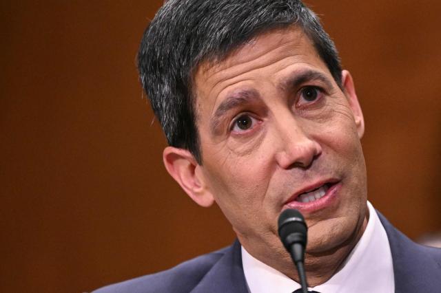 Kevin Warsh, nominee for US Federal Reserve Chair, testifies during a Senate Banking Committee hearing on his nomination on Capitol Hill in Washington, DC, on April 21, 2026. Warsh, President Donald Trump's choice to lead the US Federal Reserve, vowed Tuesday to protect central bank independence at his confirmation hearing, despite intense pressure from the president. (Photo by Mandel NGAN / AFP)