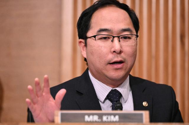 US Senator Andy Kim, Democrat from New Jersey, questions Kevin Warsh, nominee for US Federal Reserve Chair, during a Senate Banking Committee hearing on Warsh's nomination on Capitol Hill in Washington, DC, on April 21, 2026. Warsh, President Donald Trump's choice to lead the US Federal Reserve, vowed Tuesday to protect central bank independence at his confirmation hearing, despite intense pressure from the president. The hearing will be scrutinized as it marks a key hurdle that Warsh must overcome to succeed Fed Chair Jerome Powell when his term ends on May 15. (Photo by Mandel NGAN / AFP)