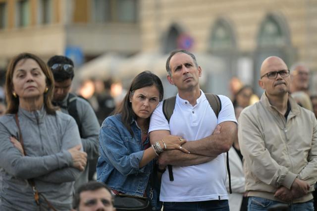 People follow a Mass on a giant screen on the first anniversary of Pope Francis’s death at the Papal Basilica of Santa Maria Maggiore in Rome on April 21, 2026. (Photo by Tiziana FABI / AFP)