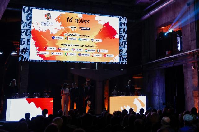 The 16 countries competing in the FIBA Women's Basketball 2026 World Cup are listed on the display during the draw in Berlin on April 21, 2026. (Photo by Odd ANDERSEN / AFP)