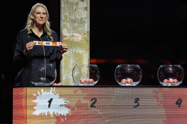 Lauren Jackson, Australian former basketball player, draws USA out of the pot to go in to Group D during the FIBA Women's Basketball 2026 World Cup draw in Berlin on April 21, 2026. (Photo by Odd ANDERSEN / AFP)